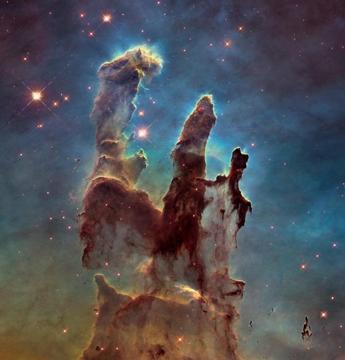 Mgławica Orzeł: Filary Stworzenia, zasłona pyłu i gazu tworząca gwiazdy na kosmicznym niebiesko-fioletowym i zielonym tle